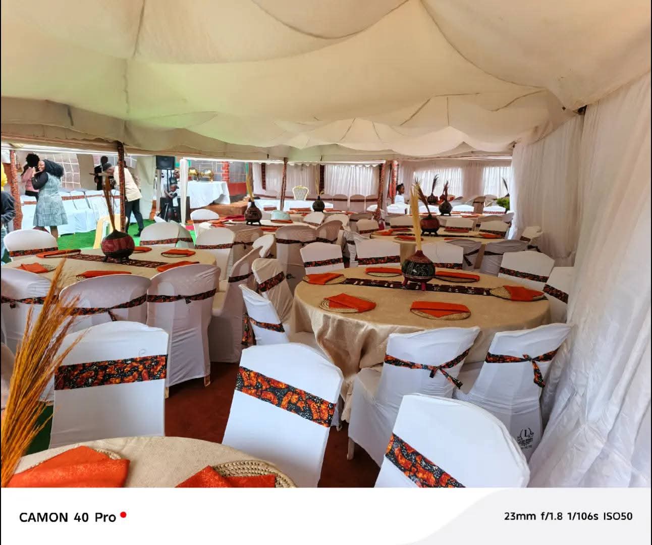 Guests Under Tent Canopy